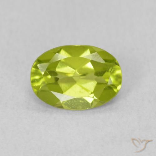 0.79ct طبيعي اخضر زاهى زبرجد, بيضوي, قليلا جدا