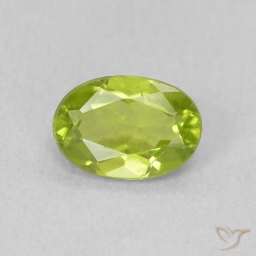 0.89ct طبيعي اخضر زاهى زبرجد, بيضوي, قليلا جدا