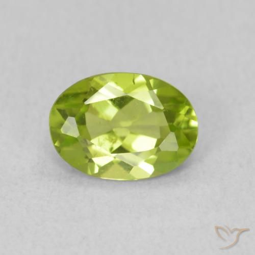 0.81ct طبيعي اخضر زاهى زبرجد, بيضوي, قليلا جدا