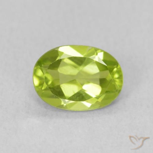 0.89ct طبيعي اخضر زاهى زبرجد, بيضوي, قليلا جدا