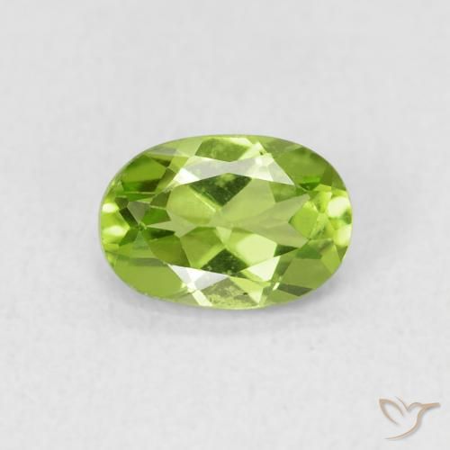 0.86ct طبيعي أخضر متوسط زبرجد, بيضوي, قليلا جدا