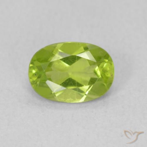 0.86ct طبيعي اخضر زاهى زبرجد, بيضوي, قليلا جدا