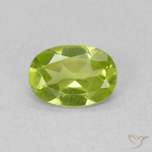 0.73ct طبيعي اخضر زاهى زبرجد, بيضوي, قليلا جدا
