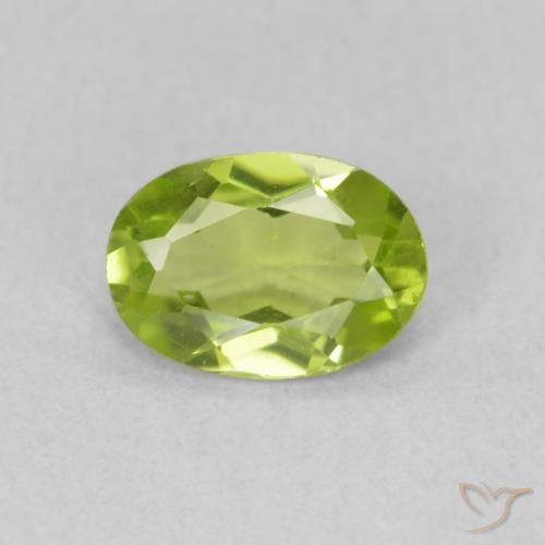 0.74ct طبيعي أخضر متوسط زبرجد, بيضوي, قليلا جدا