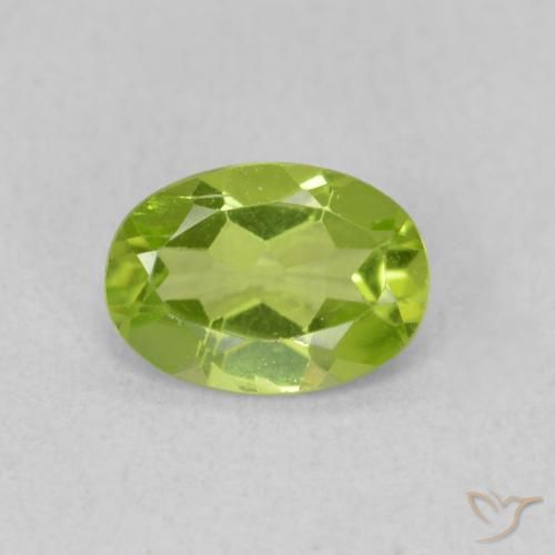 0.74ct طبيعي أخضر متوسط زبرجد, بيضوي, قليلا جدا