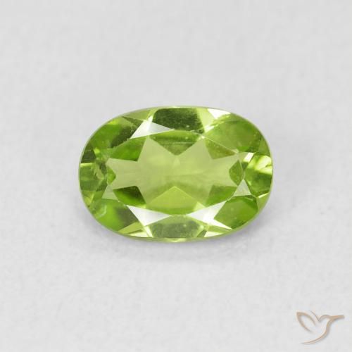 0.87ct طبيعي أخضر حيوي زبرجد, بيضوي, قليلا جدا