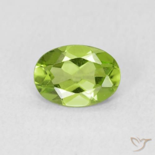 0.79ct طبيعي أخضر حيوي زبرجد, بيضوي, قليلا جدا