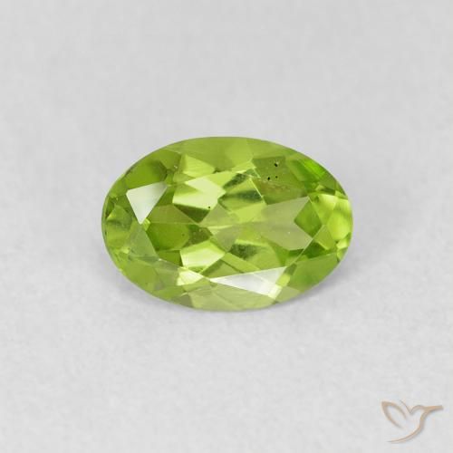 0.73ct طبيعي أخضر مصفر زبرجد, بيضوي, قليلا جدا