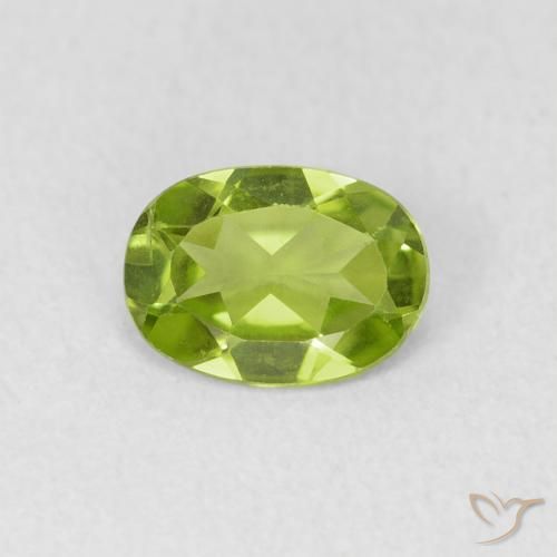 0.74ct طبيعي أخضر حيوي زبرجد, بيضوي, قليلا جدا