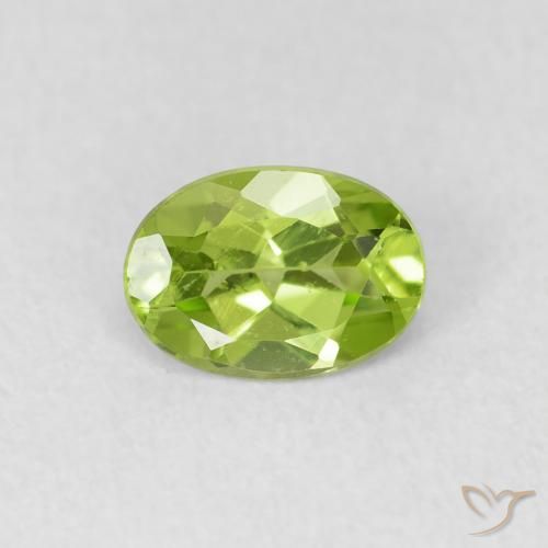 0.79ct طبيعي اخضر زاهى زبرجد, بيضوي, قليلا جدا