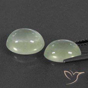 أحجار بريهنيت Olive Green  طبيعية، بيضوي، شفاف، وزنها 6.09 قيراط