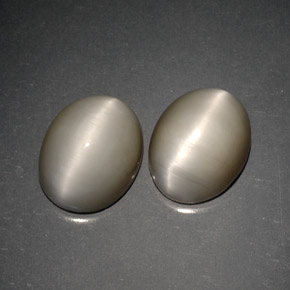 Quartz Cat's Eye طبيعي بلون دخاني، وزن ‎‎ قيراط، شكل بيضاوى، مقاس ‎10x8.1‎ مم