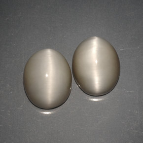 Quartz Cat's Eye طبيعي بلون دخاني، وزن ‎‎ قيراط، شكل بيضاوى، مقاس ‎10x8.1‎ مم