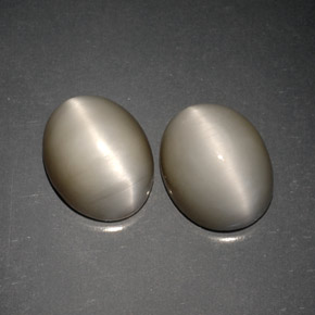 Quartz Cat's Eye طبيعي بلون دخاني، وزن ‎‎ قيراط، شكل بيضاوى، مقاس ‎10x8.1‎ مم