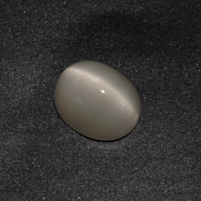 Quartz Cat's Eye طبيعي بلون دخاني، وزن ‎3.42‎ قيراط، شكل بيضاوى، مقاس ‎10.1x8.1‎ مم