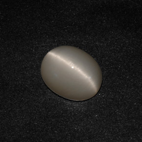 Quartz Cat's Eye طبيعي بلون دخاني، وزن ‎3.17‎ قيراط، شكل بيضاوى، مقاس ‎10.1x8.2‎ مم