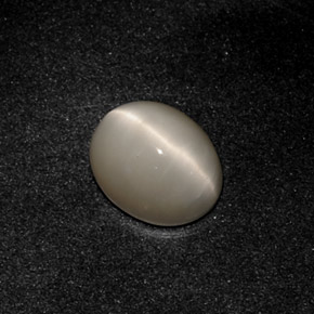 Quartz Cat's Eye طبيعي بلون دخاني، وزن ‎3.19‎ قيراط، شكل بيضاوى، مقاس ‎10x8.1‎ مم