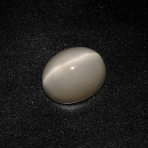 Quartz Cat's Eye طبيعي بلون دخاني، وزن ‎3.19‎ قيراط، شكل بيضاوى، مقاس ‎10x8.1‎ مم