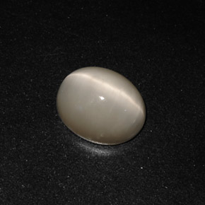 Quartz Cat's Eye طبيعي بلون دخاني، وزن ‎3.19‎ قيراط، شكل بيضاوى، مقاس ‎10x8.1‎ مم