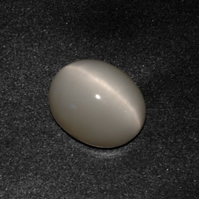 Quartz Cat's Eye طبيعي بلون دخاني، وزن ‎3.07‎ قيراط، شكل بيضاوى، مقاس ‎10x8.2‎ مم
