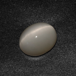 Quartz Cat's Eye طبيعي بلون دخاني، وزن ‎3.07‎ قيراط، شكل بيضاوى، مقاس ‎10x8.2‎ مم