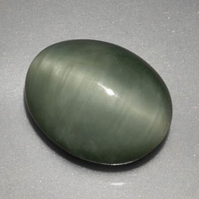 Quartz Cat's Eye طبيعي بلون أخضر، وزن ‎3.91‎ قيراط، شكل بيضاوى، مقاس ‎11x8.8‎ مم