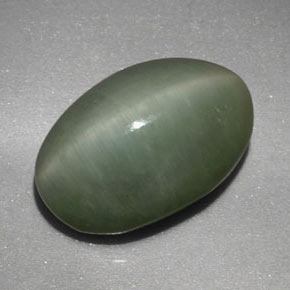 Quartz Cat's Eye طبيعي بلون أخضر، وزن ‎4.77‎ قيراط، شكل بيضاوى، مقاس ‎12.4x8.3‎ مم