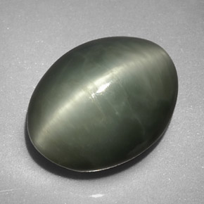 Quartz Cat's Eye طبيعي بلون أخضر، وزن ‎7.74‎ قيراط، شكل بيضاوى، مقاس ‎13x10.2‎ مم