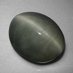 Quartz Cat's Eye طبيعي بلون أخضر، وزن ‎6.16‎ قيراط، شكل بيضاوى، مقاس ‎12.9x10.1‎ مم