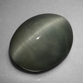 Quartz Cat's Eye طبيعي بلون أخضر، وزن ‎6.16‎ قيراط، شكل بيضاوى، مقاس ‎12.9x10.1‎ مم