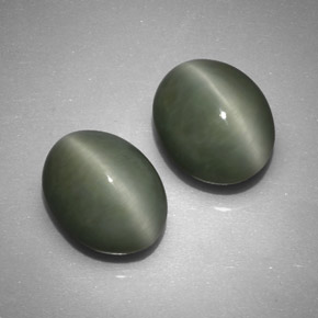 Quartz Cat's Eye طبيعي بلون أخضر، وزن ‎‎ قيراط، شكل بيضاوى، مقاس ‎11.6x9‎ مم