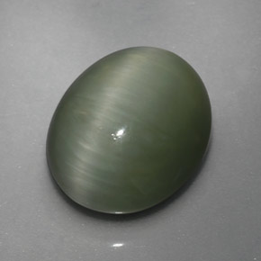 Quartz Cat's Eye طبيعي بلون أخضر، وزن ‎3.64‎ قيراط، شكل بيضاوى، مقاس ‎10.2x8.5‎ مم