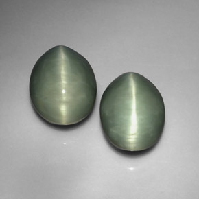 Quartz Cat's Eye طبيعي بلون أخضر، وزن ‎‎ قيراط، شكل بيضاوى، مقاس ‎13x10.3‎ مم