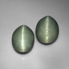 Quartz Cat's Eye طبيعي بلون أخضر، وزن ‎‎ قيراط، شكل بيضاوى، مقاس ‎13x10.3‎ مم