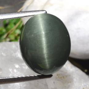 Quartz Cat's Eye طبيعي بلون أخضر، وزن ‎7.61‎ قيراط، شكل بيضاوى، مقاس ‎12.5x10.6‎ مم