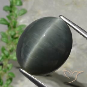 كوارتز عين القط رمادى داكن طبيعي، قصة بيضاوى، 8.57 قيراط، غير شفاف