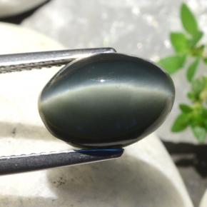 Quartz Cat's Eye طبيعي بلون أخضر، وزن ‎5.06‎ قيراط، شكل بيضاوى، مقاس ‎11.5x8.3‎ مم
