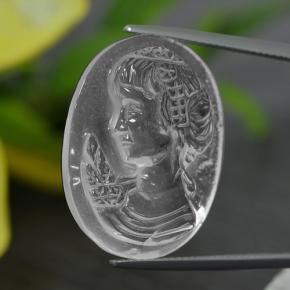 كوارتز طبيعي بلون أبيض، وزن ‎24.34‎ قيراط، شكل شكل خيالي، مقاس ‎26.2x20.3‎ مم