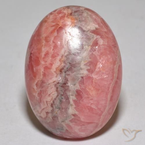 رودوكروسيت متعدد الألوان طبيعي، قصة بيضاوى، 36.55 قيراط، غير شفاف