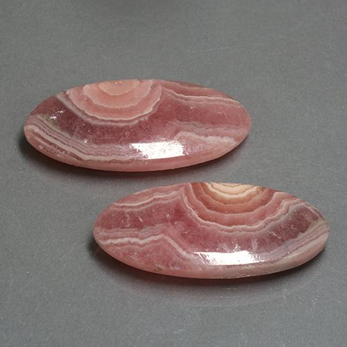 أحجار رودوكروسيت متعدد الألوان طبيعية، قصة بيضاوى، نصف شفاف، وزنها 36.60 قيراط