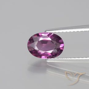 1.38ct طبيعي أرجوانى متوسط عقيق رودوليت, بيضوي, قليلا جدا