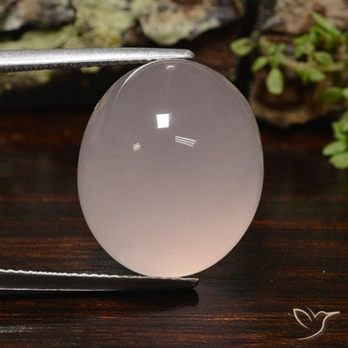31.95ct طبيعي وردي فاتح كوارتز زهرى, بيضوي, نصف شفاف