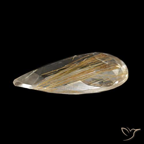 توباز روتيل طبيعي بلون بنى-ذهبى فاتح جدا، وزن ‎3.34‎ قيراط، شكل شكل الكمثرى، مقاس ‎13.9x7.9‎ مم