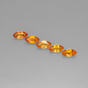 ياقوت طبيعي بلون Apricot Orange ، وزن ‎2.76‎ قيراط، شكل ماركيز، مقاس ‎7.2x3.6‎ مم