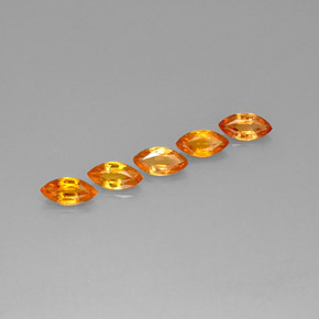 ياقوت طبيعي بلون Apricot Orange ، وزن ‎2.76‎ قيراط، شكل ماركيز، مقاس ‎7.2x3.6‎ مم