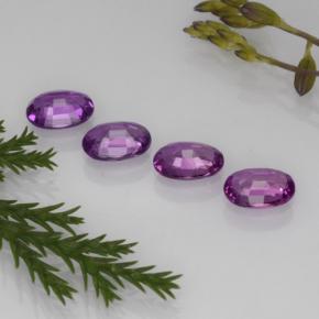 ياقوت طبيعي بلون Pinkish Grape ، وزن ‎2.23‎ قيراط، شكل بيضاوى، مقاس ‎6x4.1‎ مم