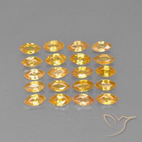 ياقوت طبيعي بلون Medium-Light Orange-Gold ، وزن ‎3.90‎ قيراط، شكل ماركيز، مقاس ‎4.9x2.5‎ مم