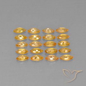 ياقوت طبيعي بلون Medium-Light Orange-Gold ، وزن ‎3.90‎ قيراط، شكل ماركيز، مقاس ‎4.9x2.5‎ مم