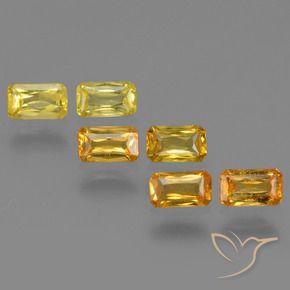 ياقوت طبيعي بلون Medium-Light Orange-Gold ، وزن ‎1.86‎ قيراط، شكل قص الزمرد، مقاس ‎4.9x2.9‎ مم