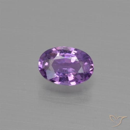 0.54ct طبيعي بنفسجى وردى متوسط زفير, بيضوي, قليلا جدا